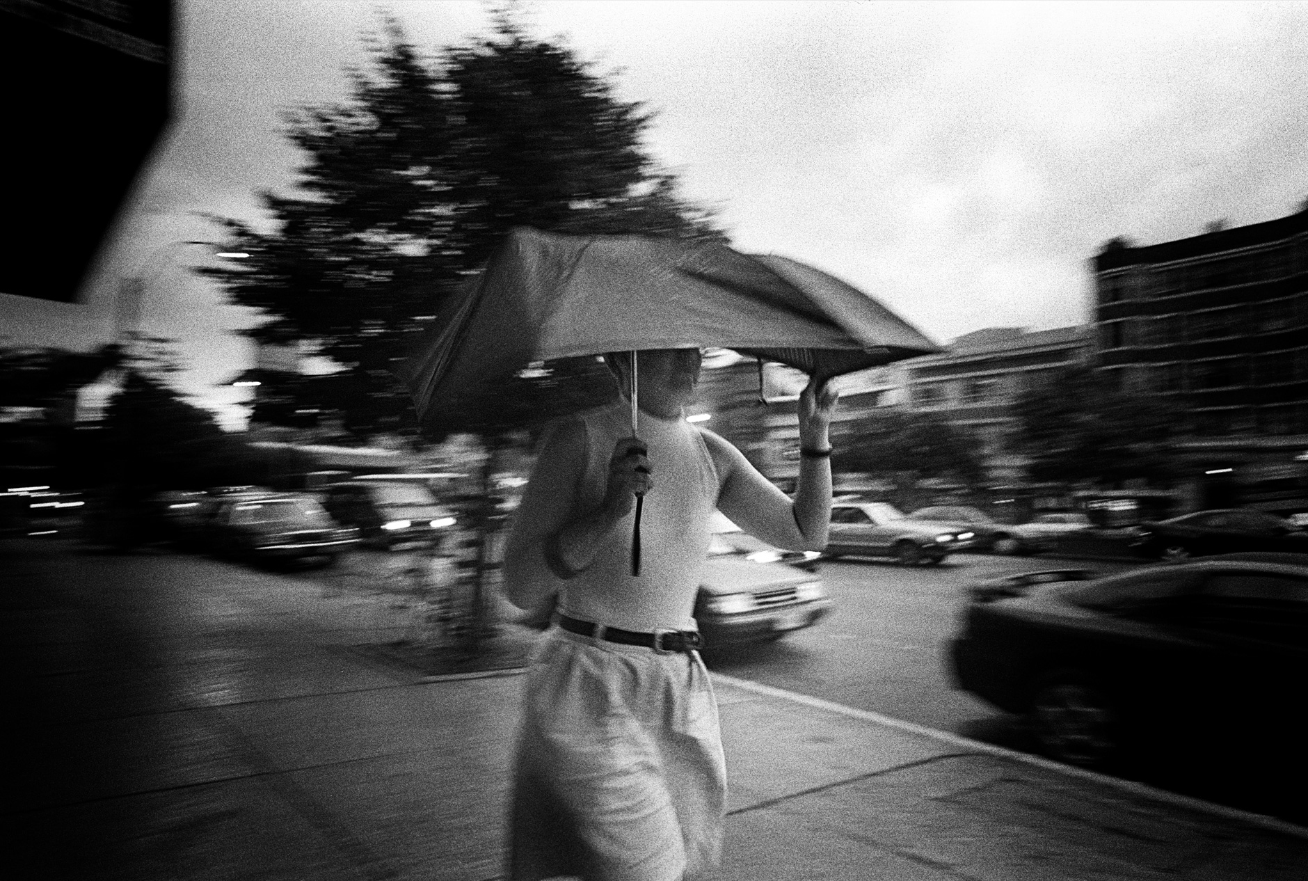 women with umbrella in rain