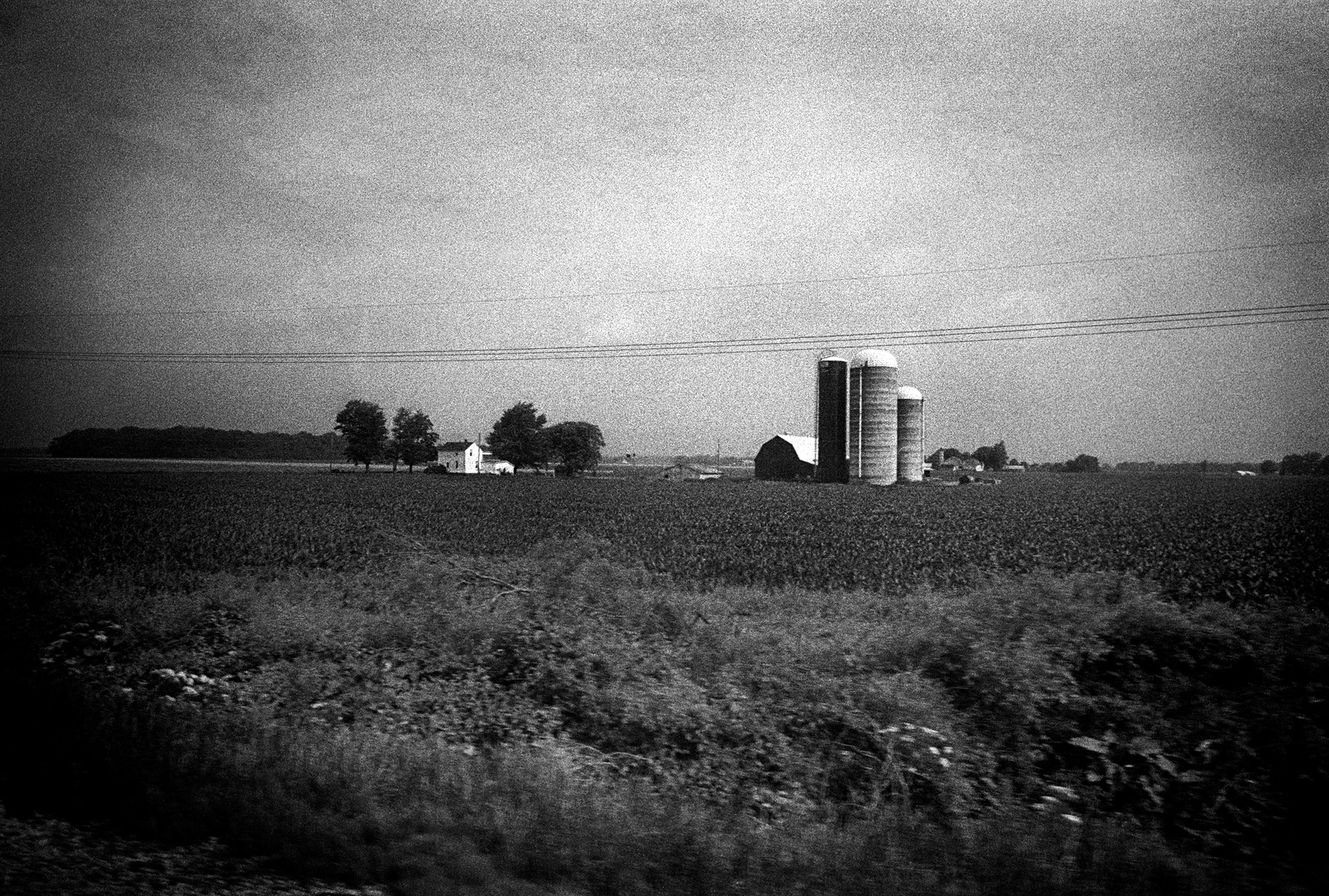 Photo taken through the train window in USA black and white landscape