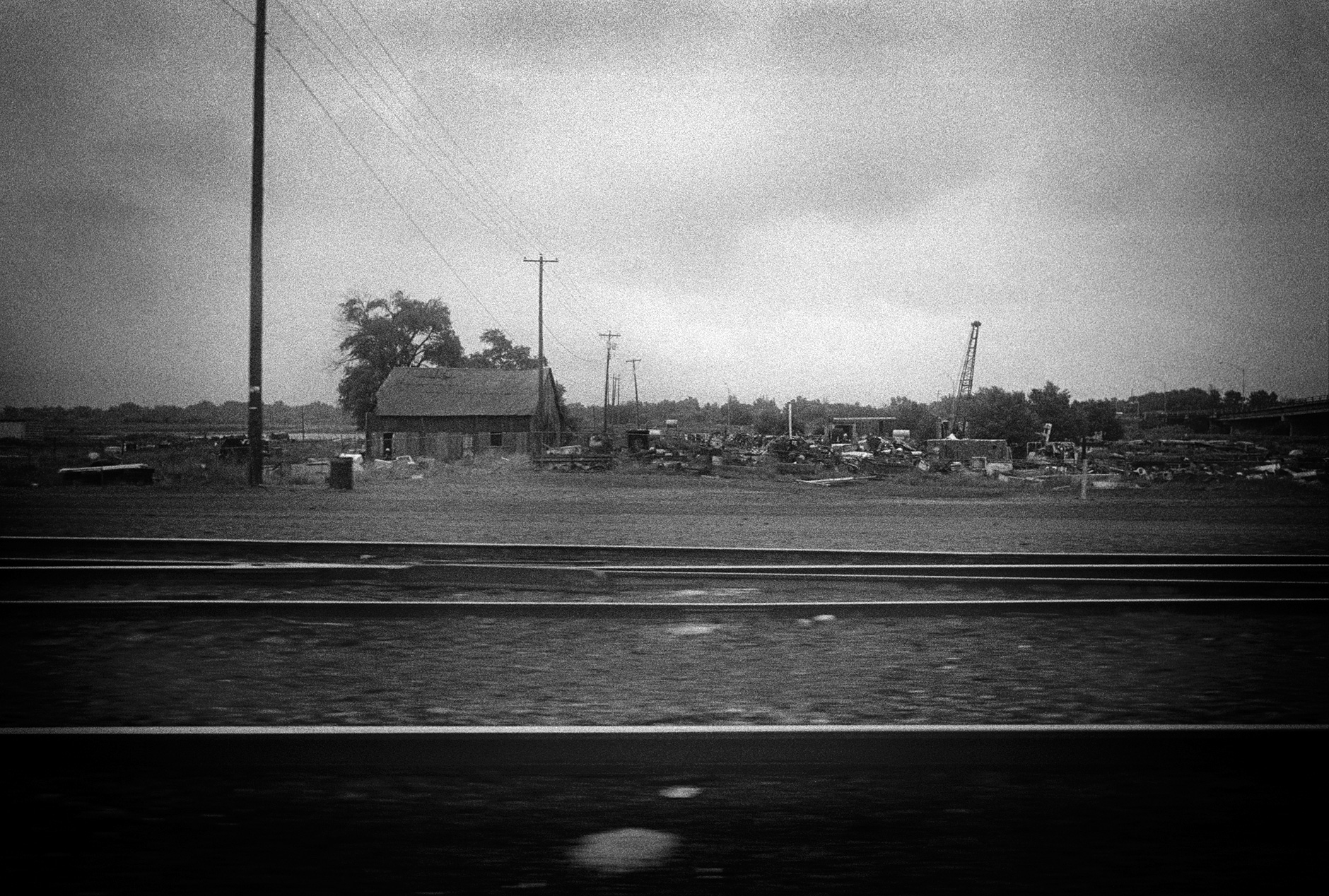 Photo taken through the train window in USA black and white landscape