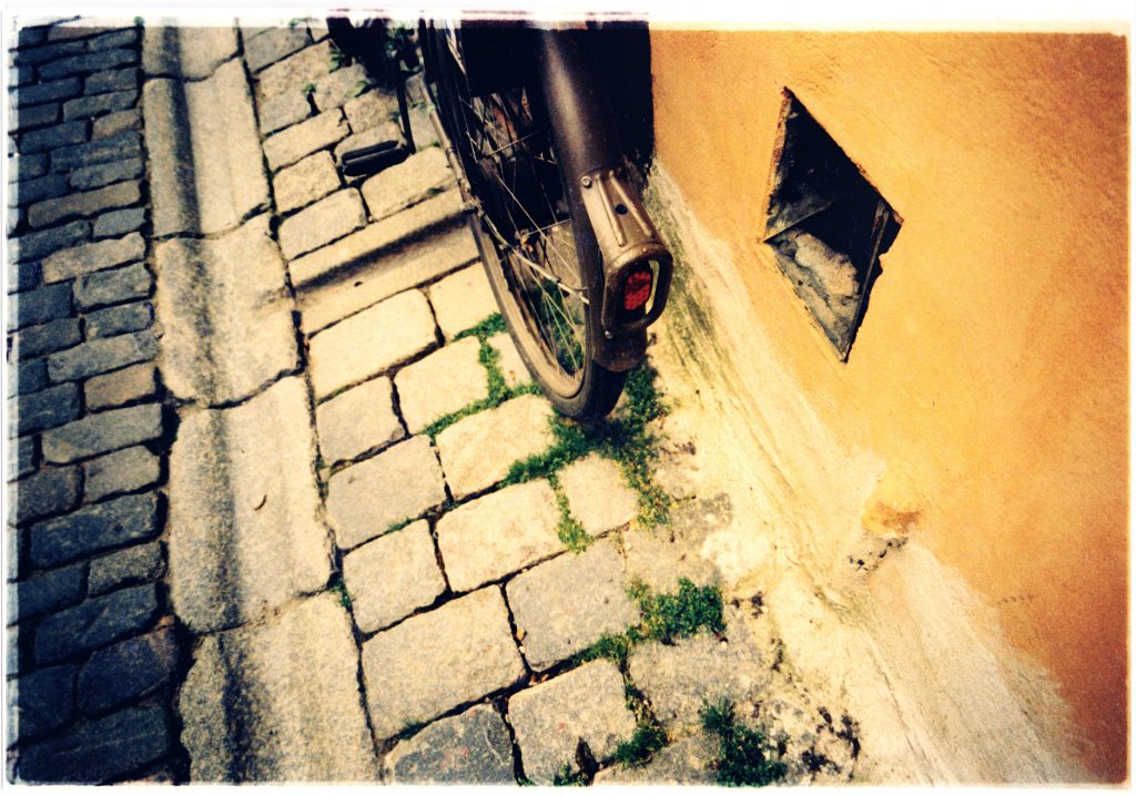 Color photo of Bike in urban surroundings