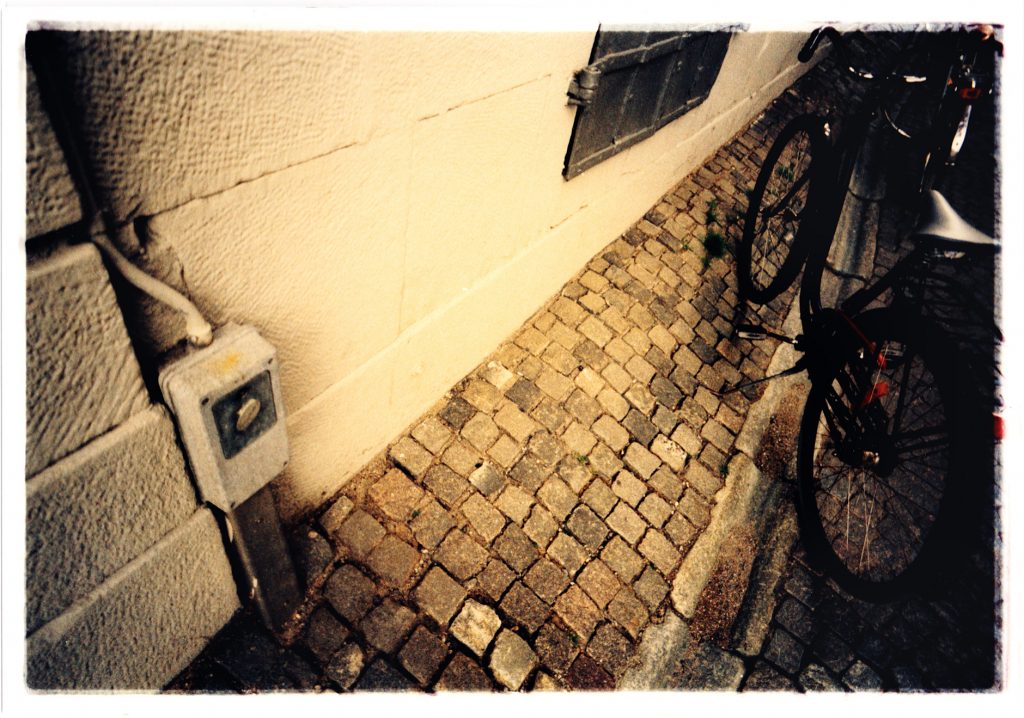 Color photo of Bike in urban surroundings