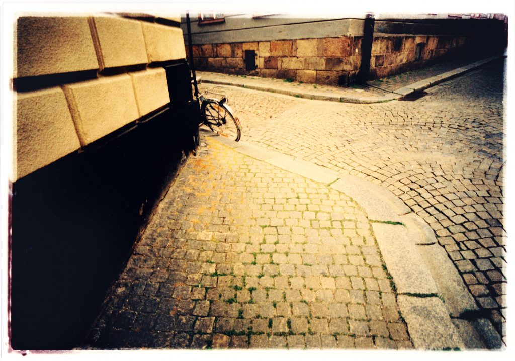 Color photo of Bike in urban surroundings