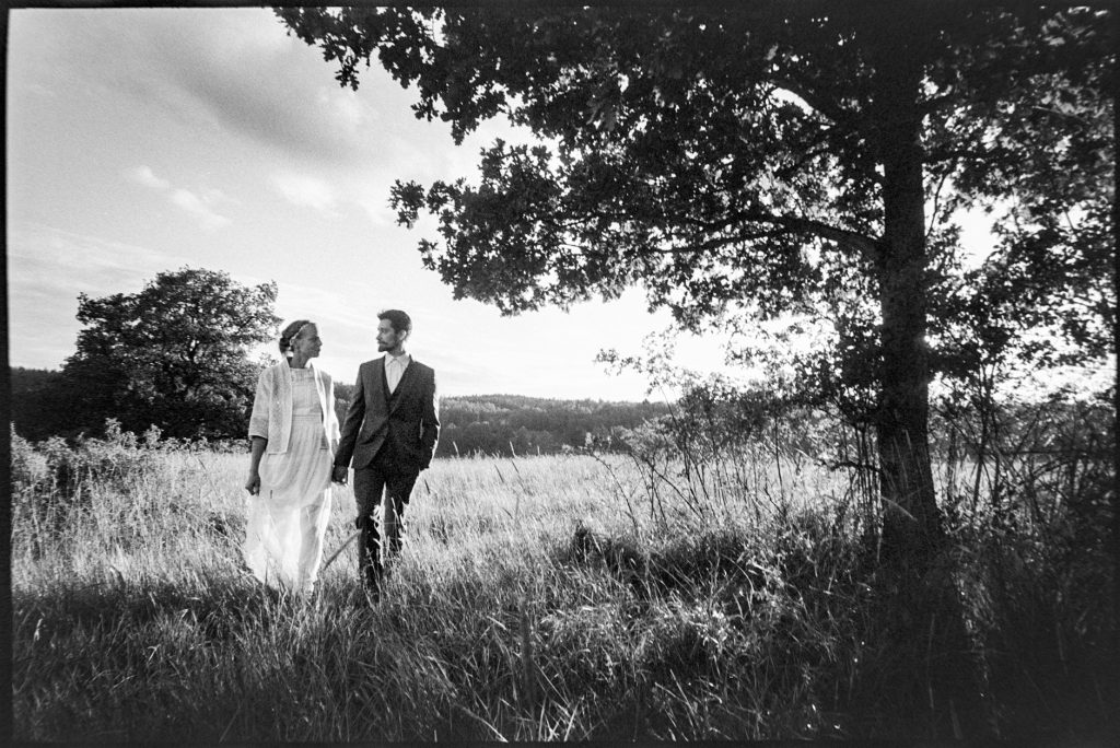 black and white wedding picture outside Wedding Skärblacka, Sweden