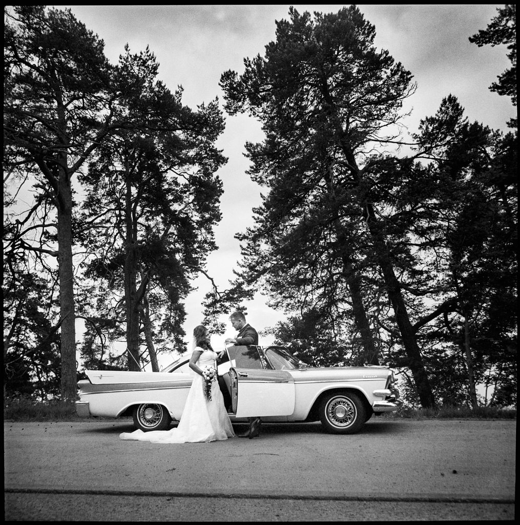 black and white wedding picture outside Wedding Krokek, Sweden