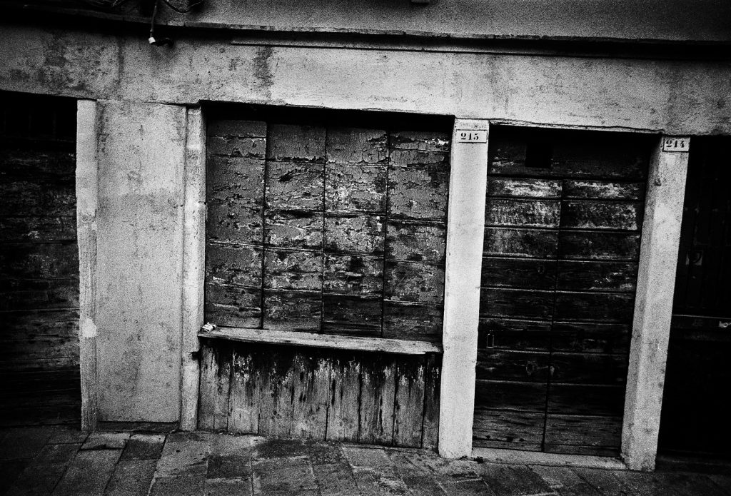 Black and white image from a street in Venice, Italy 