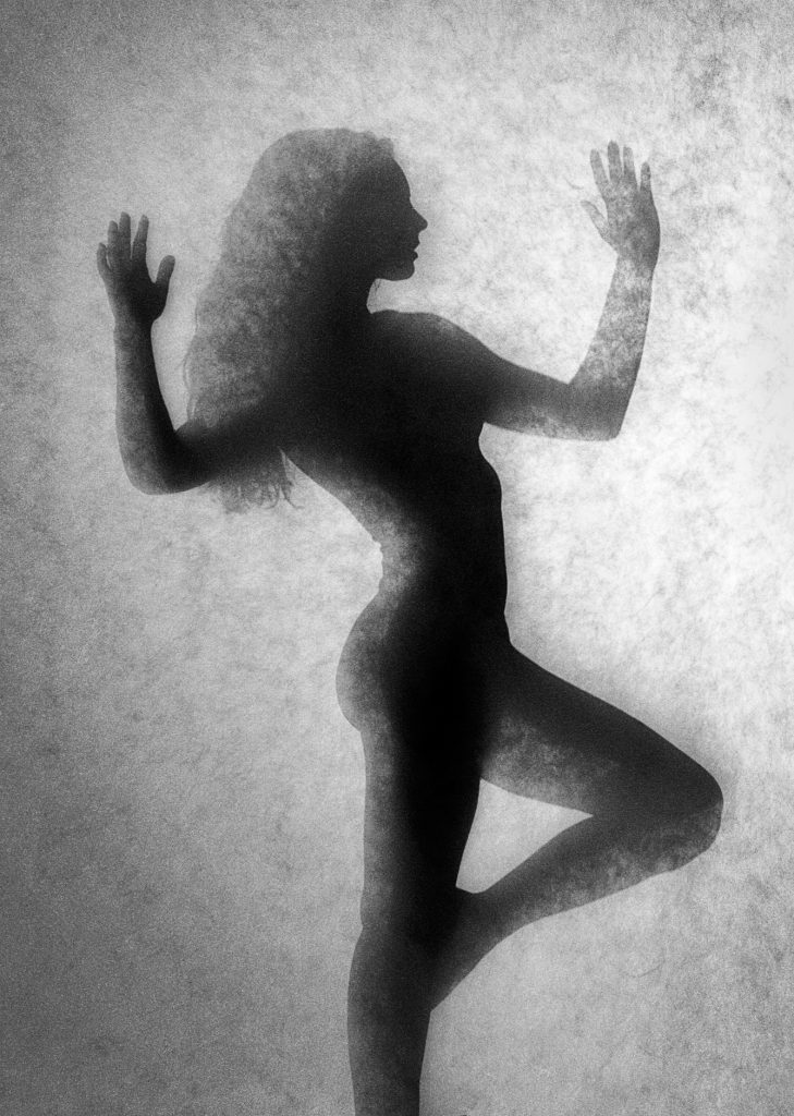 Black and white image of silhouette of a dancer