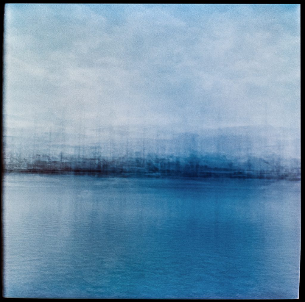 Blue multiple exposure images In transit Denmark