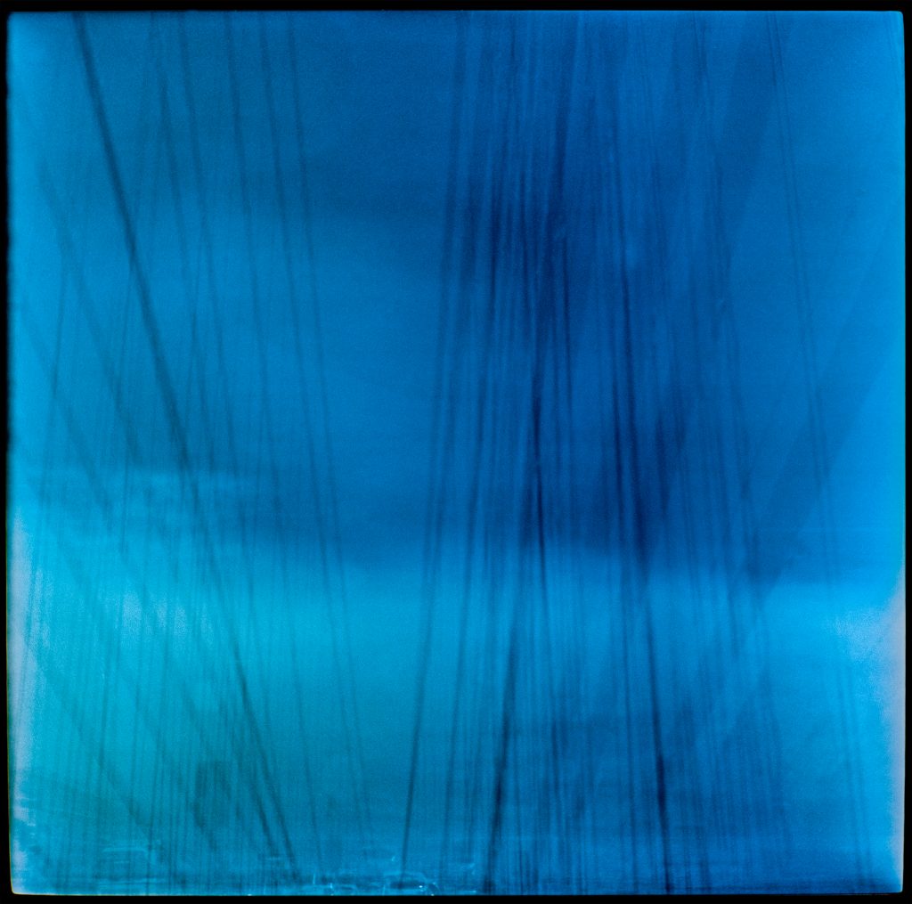 Blue multiple exposure images In transit Denmark