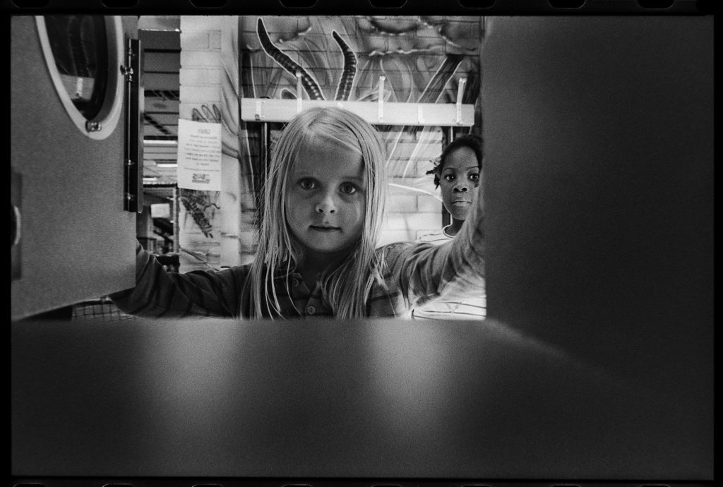 black and white image two girls playing