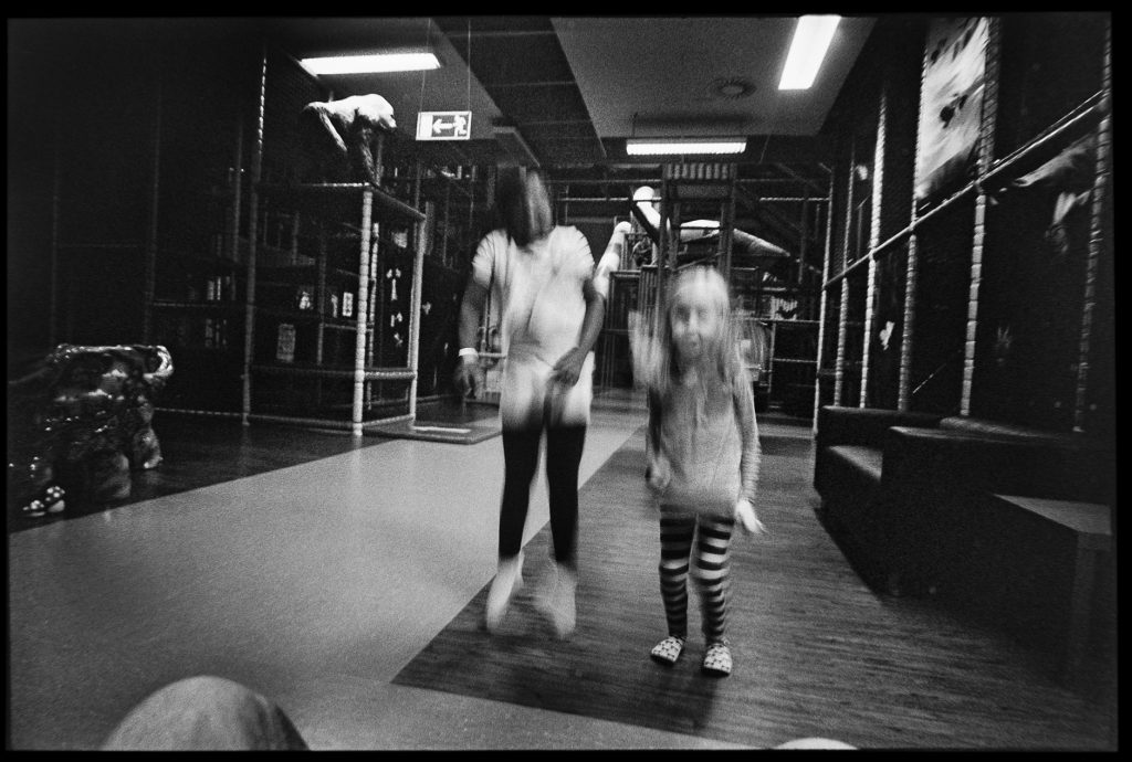 black and white image two girls playing